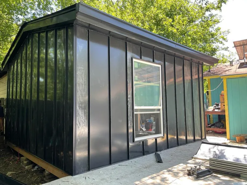 Black standing seam metal wall panels for Roof Inspection in Fort Shawnee