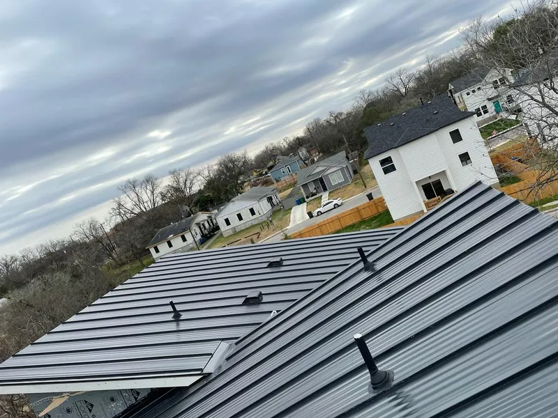Standing seam metal roof panels with vents for Skylight Repair in Fort Shawnee